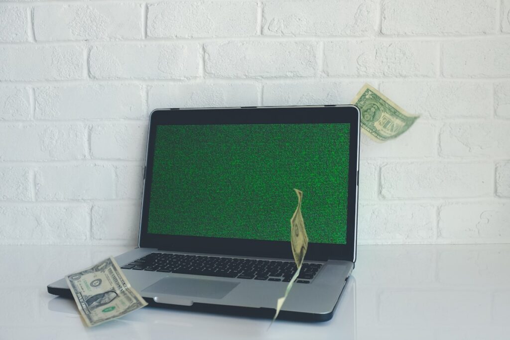 Laptop on desk representing online income and side hustles