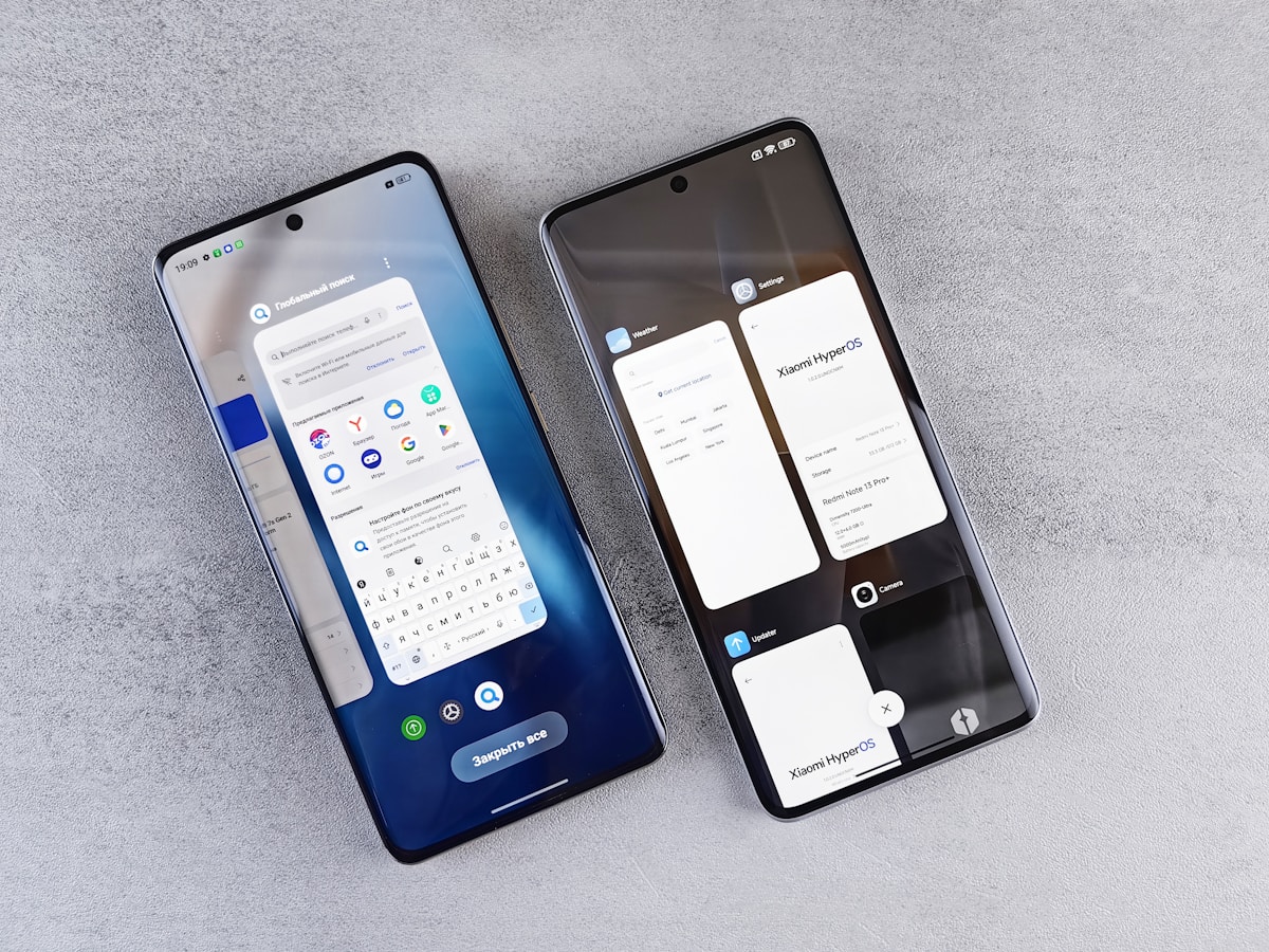 Comparing two budgeting apps side by side on smartphones